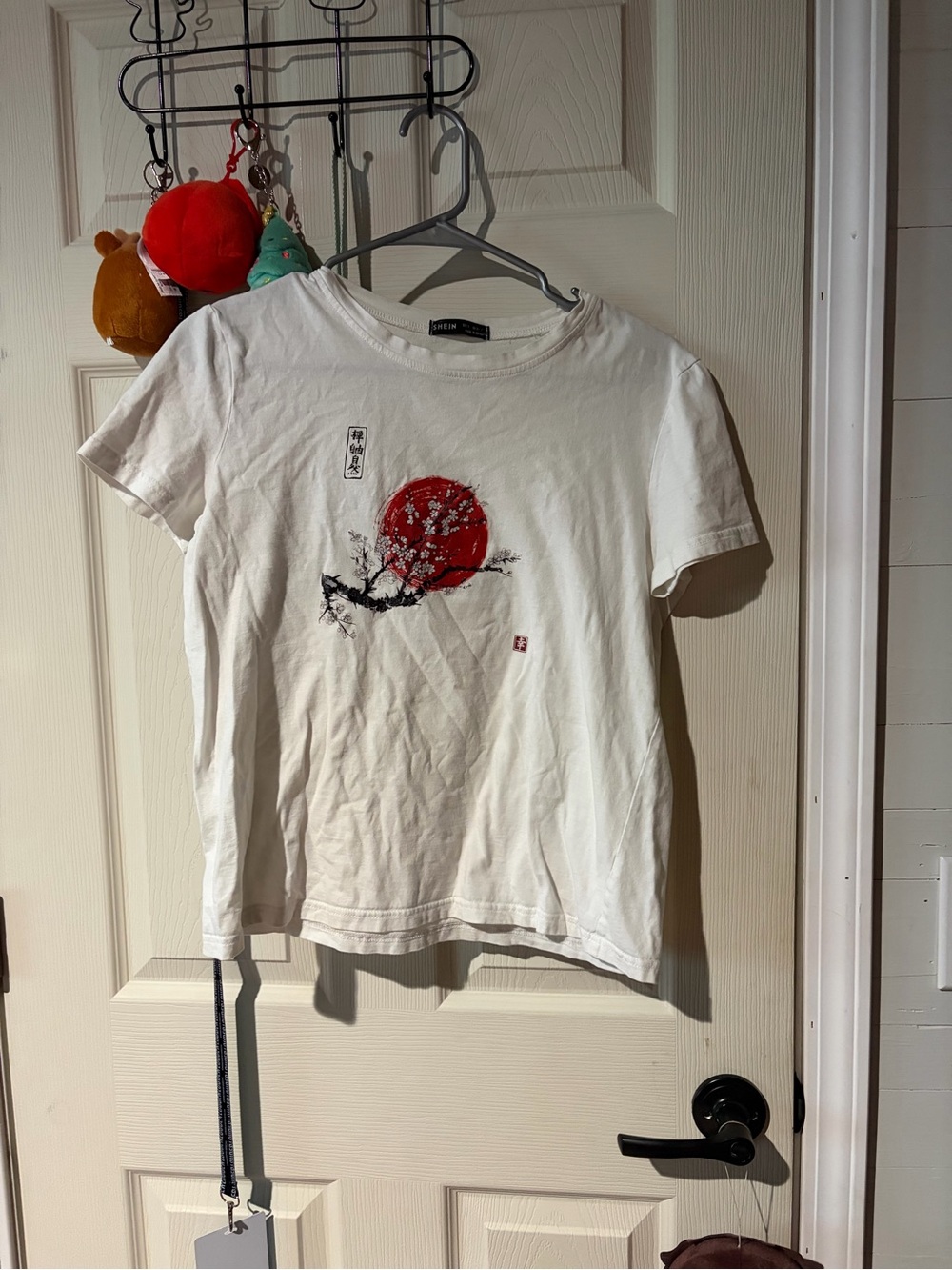 White Graphic Tee with Red Sun Print